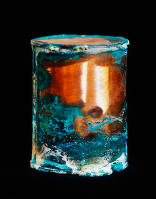 Illustration for article titled Surprisingly beautiful photographs of decaying cans of human remains